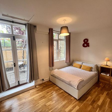 Charming 1-Bedroom Apartment Southfields, Londra Exterior foto